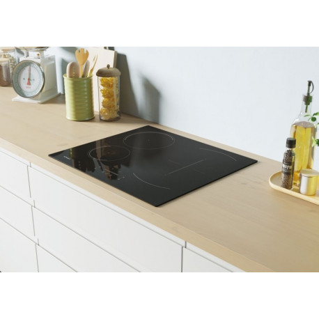The Candy CTP6SC4/E1 is a 60cm built-in induction hob. It is known for its sleek de