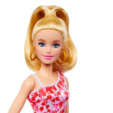 Mattel Barbie Fashionistas doll with blonde ponytail and floral dress