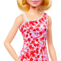 Mattel Barbie Fashionistas doll with blonde ponytail and floral dress