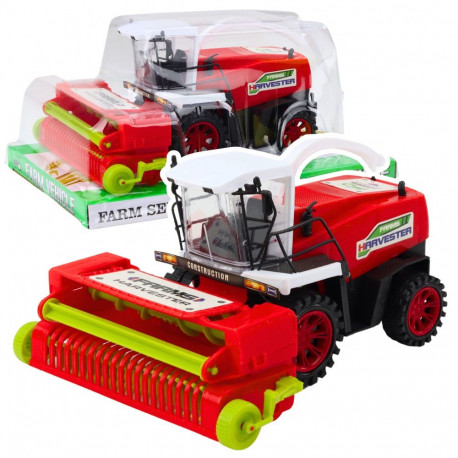 põllumajanduslik kombain heederiga punane