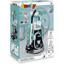Cleaning trolley with vacuum cleaner