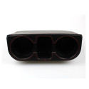 Cup holder between seats black
