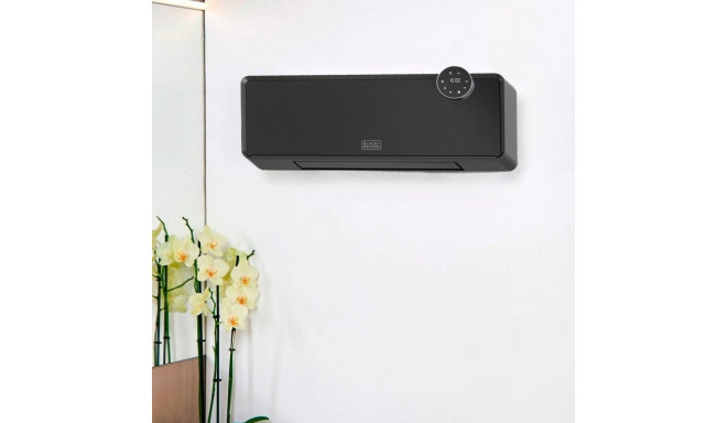 A portable device that warms a room by blowing air over an electric heating element.
